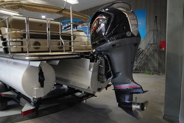 Slide: The Image of 2024 Starcraft SLS 3 Q DH pontoon boat with outboard motor. - 9
