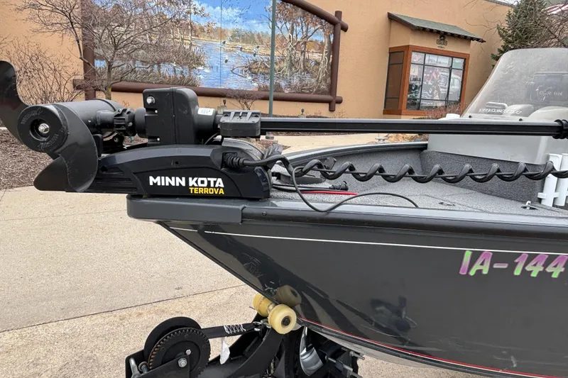 Slide: The Image of 2019 Tracker Pro Guide V-16 SC boat with Minn Kota Terrova trolling motor. - 2