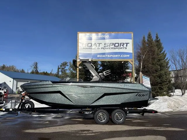 The Image of 2026 Tigé Z3 boat on trailer in front of Boat Sport shop. - 1
