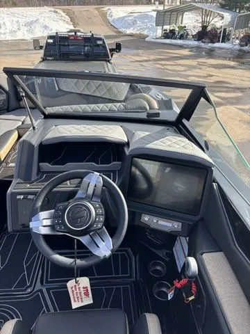 Slide: The Image of Interior of a 2026 Tigé Z3 boat with modern dashboard. - 20