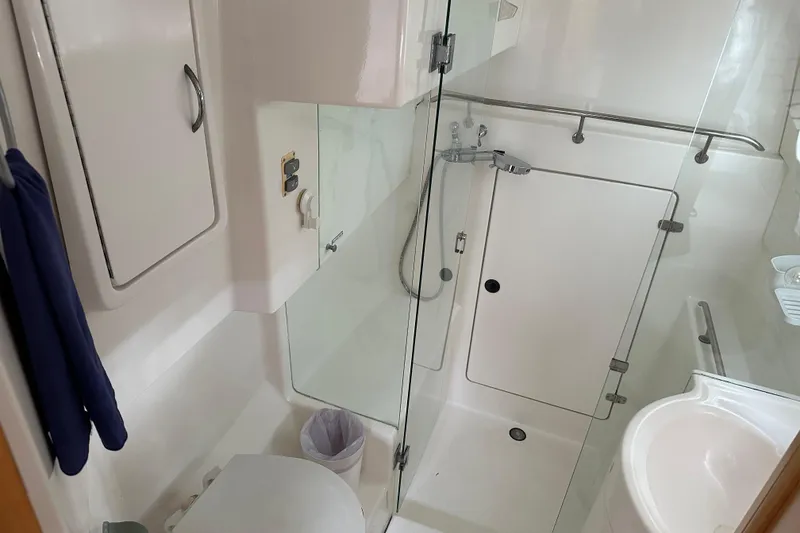 Slide: The Image of Bathroom interior of 2005 Seawind 1160 catamaran with shower and toilet. - 27