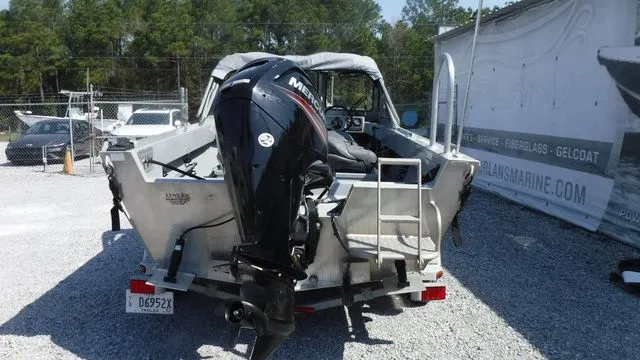 Slide: The Image of 2018 Hewescraft Sportsman 160 boat with outboard motor on trailer. - 3