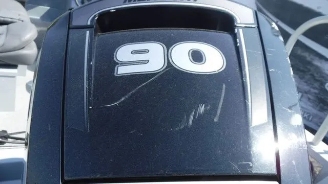 Slide: The Image of 90 HP outboard motor on 2018 Hewescraft Sportsman 160. - 4