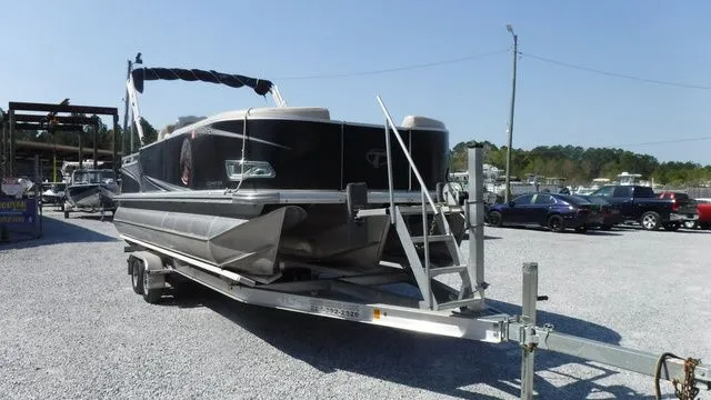 Slide: The Image of 2018 Tahoe LTZ Cruise 24' pontoon boat on trailer. - 6