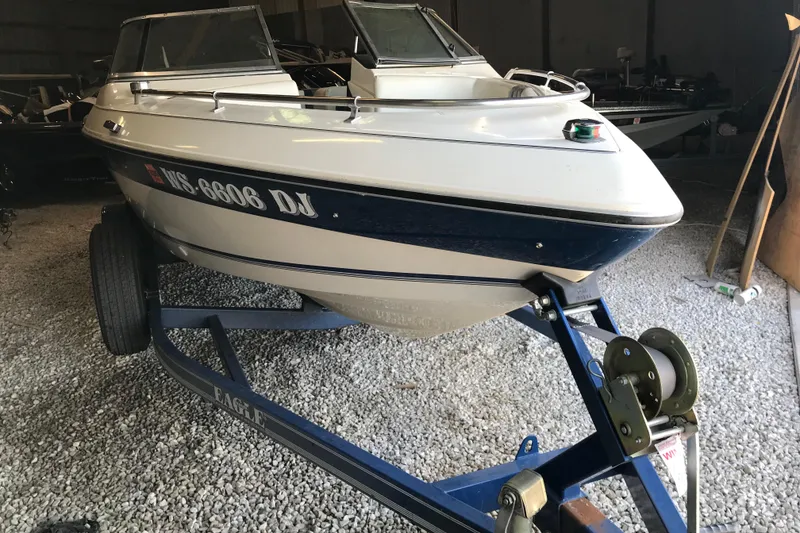Slide: The Image of 1992 Seaswirl 190 Bowrider I/O on trailer in storage facility. - 9