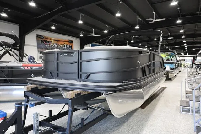 Slide: The Image of Evotti 521 CS 2026 pontoon boat in a showroom. - 4
