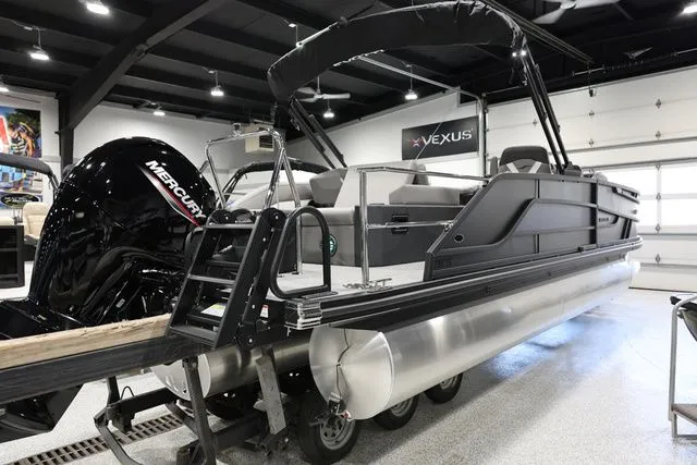 Slide: The Image of Evotti 521 CS pontoon boat 2026 in a workshop. - 7