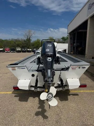 Slide: The Image of Rear view of a 2026 G3 Bay 17 boat model with outboard motor. - 6