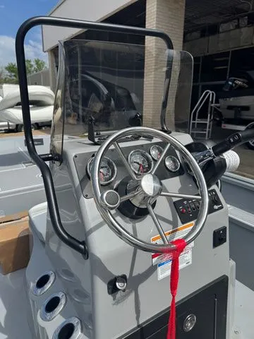 Slide: The Image of Steering console of the 2026 G3 Bay 17 boat model. - 8