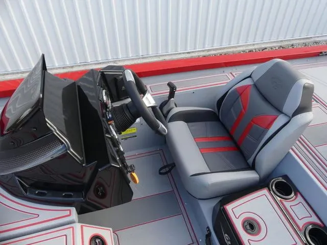 Slide: The Image of Interior of 2026 G3 Sportsman 1710 SE with gray and red seats. - 11