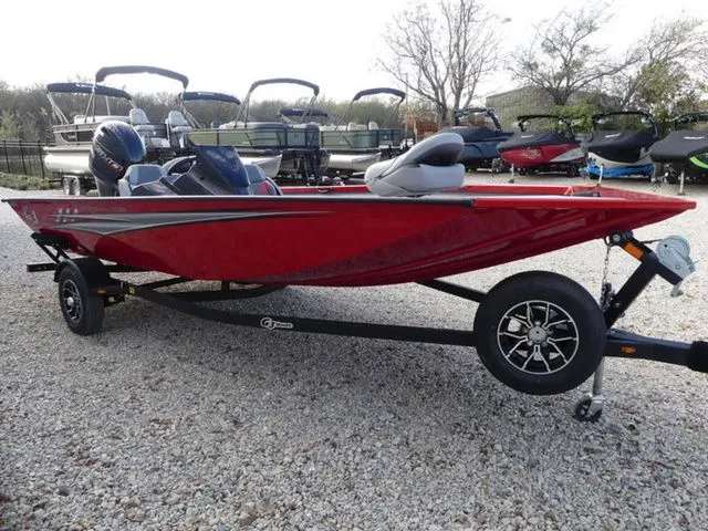 Slide: The Image of Red 2026 G3 Sportsman 1710 SE boat on trailer, gravel ground. - 7