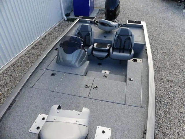 Slide: The Image of 2026 G3 Sportsman 1810 PFX boat with gray deck and seating. - 20