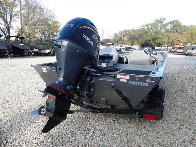 Slide: The Image of 2026 G3 Sportsman 1810 PFX boat with Yamaha engine on gravel lot. - 6