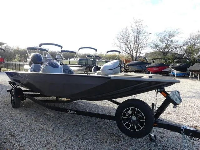 Slide: The Image of 2026 G3 Sportsman 1810 PFX boat on trailer outdoors. - 7