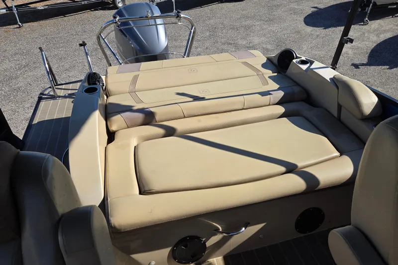 Slide: The Image of Luxurious seating on 2020 Godfrey AquaPatio 235 C pontoon boat, featuring beige upholstery. - 10