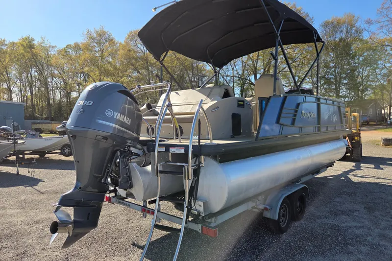 Slide: The Image of 2020 Godfrey AquaPatio 235 C pontoon boat with Yamaha 300 engine on trailer. - 4