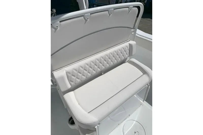 Slide: The Image of 2026 Sea Hunt Ultra 239 SE boat seat with white cushioned upholstery. - 15