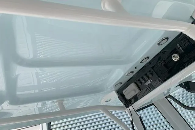 Slide: The Image of 2026 Sea Hunt Ultra 239 SE boat interior ceiling with integrated lighting and controls. - 9