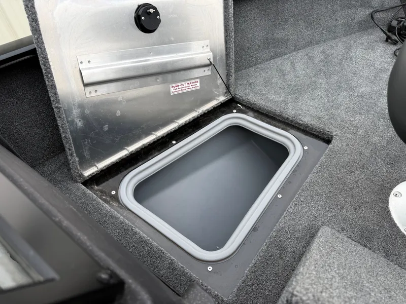 Slide: The Image of 2023 Tracker Pro Guide V-175WT boat with open storage compartment. - 12