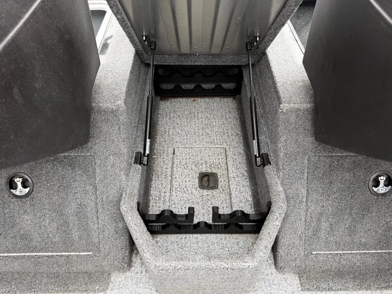 Slide: The Image of 2023 Tracker Pro Guide V-175WT boat with open storage compartment. - 14