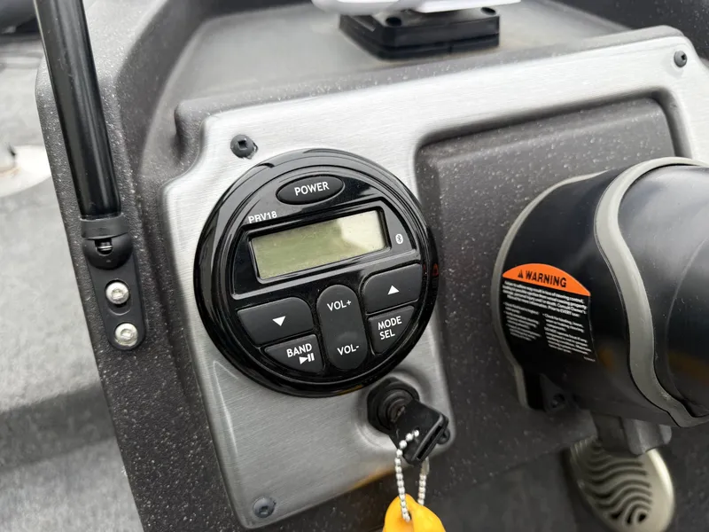 Slide: The Image of 2023 Tracker Pro Guide V-175WT console with controls. - 19