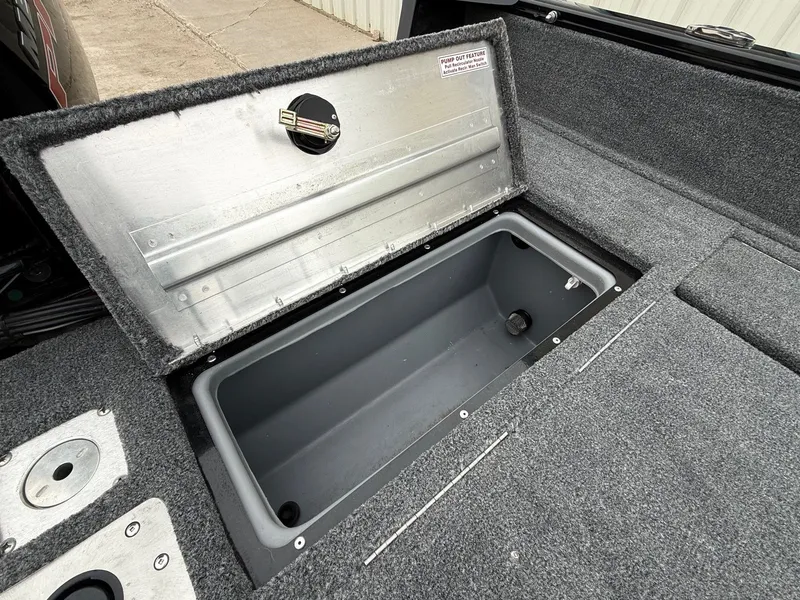 Slide: The Image of 2023 Tracker Pro Guide V-175WT boat with open storage compartment. - 28