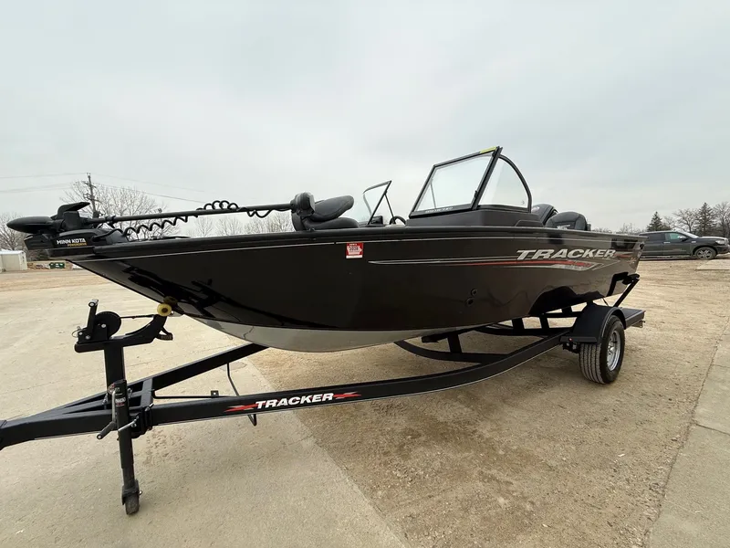 Slide: The Image of 2023 Tracker Pro Guide V-175WT boat on trailer, side view. - 3