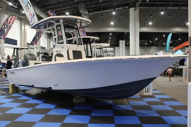 The Image of 2026 Tidewater Carolina Bay 2500 boat displayed at a show. - 1