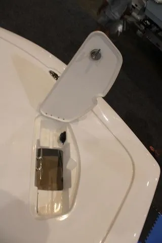 Slide: The Image of Tidewater Carolina Bay 2500 2026, open storage compartment lid. - 9