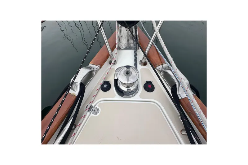 Slide: The Image of Bow of a 2016 Tartan 4000 sailboat with winch and ropes. - 10