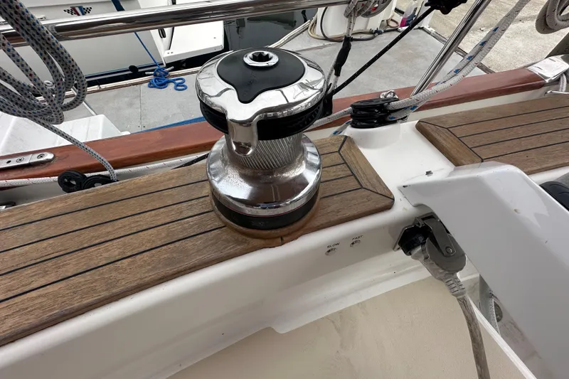 Slide: The Image of Deck of 2016 Tartan 4000 sailboat featuring a winch and teak wood finish. - 14
