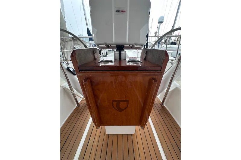Slide: The Image of Cockpit of 2016 Tartan 4000 sailboat with wooden finish and navigation equipment. - 18