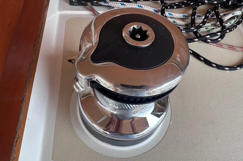 Slide: The Image of Chrome winch on Tartan 4000 sailboat, 2016 model, with ropes in background. - 21