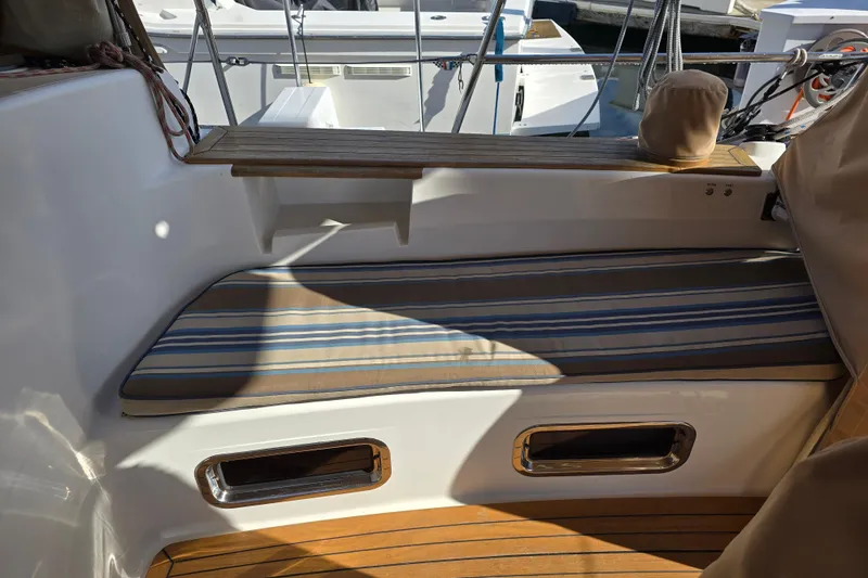 Slide: The Image of Cozy seating area on a 2016 Tartan 4000 yacht with striped cushions. - 23