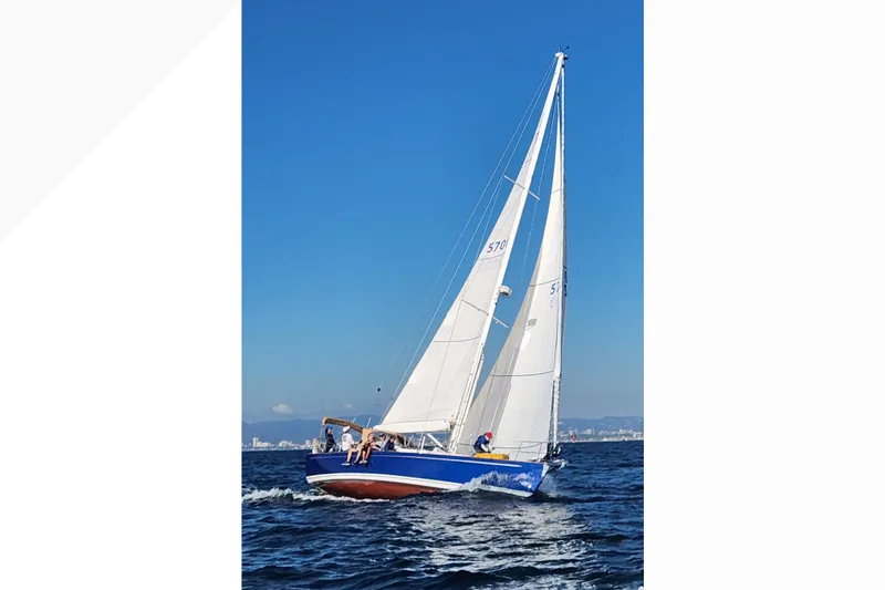 Slide: The Image of Sailing yacht Tartan 4000 (2016) gliding on open sea under clear blue sky. - 3