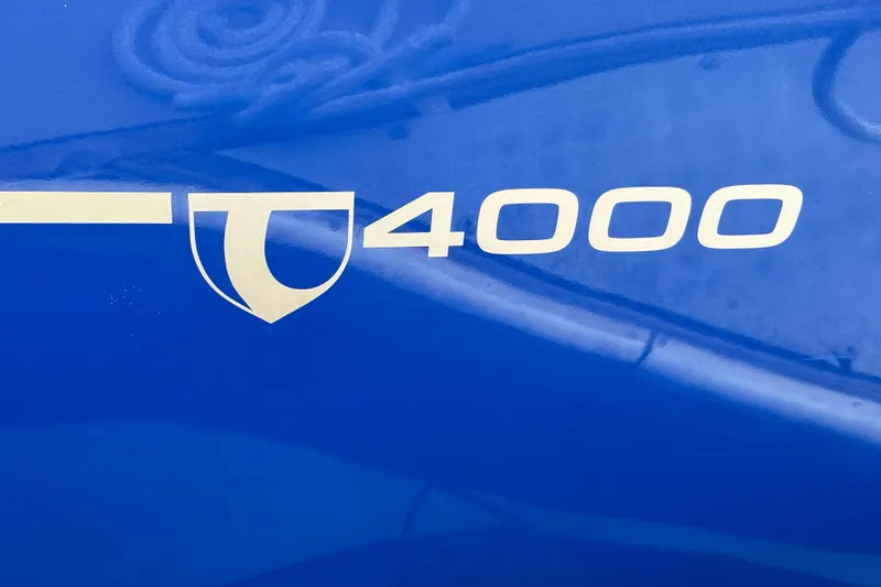 Slide: The Image of Blue Tartan 4000 logo on vehicle, model year 2016. - 44