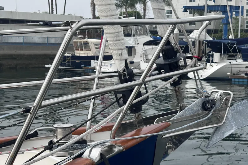 Slide: The Image of Sailboat bow with anchor and rigging, Tartan 4000, 2016 model, docked in marina. - 7