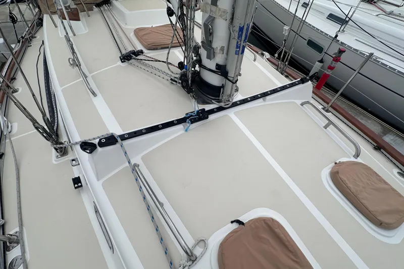 Slide: The Image of Sailboat deck of 2016 Tartan 4000 with rigging and hatches in marina. - 9