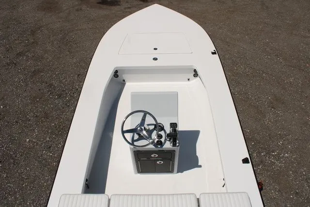 Slide: The Image of 2024 East Cape Vantage boat interior with steering console. - 18