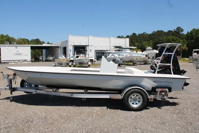 Slide: The Image of 2024 East Cape Vantage boat on trailer outdoors. - 3