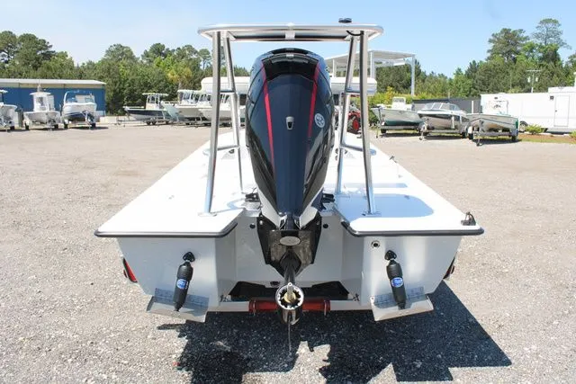 Slide: The Image of Rear view of a 2024 East Cape Vantage boat outdoors. - 5