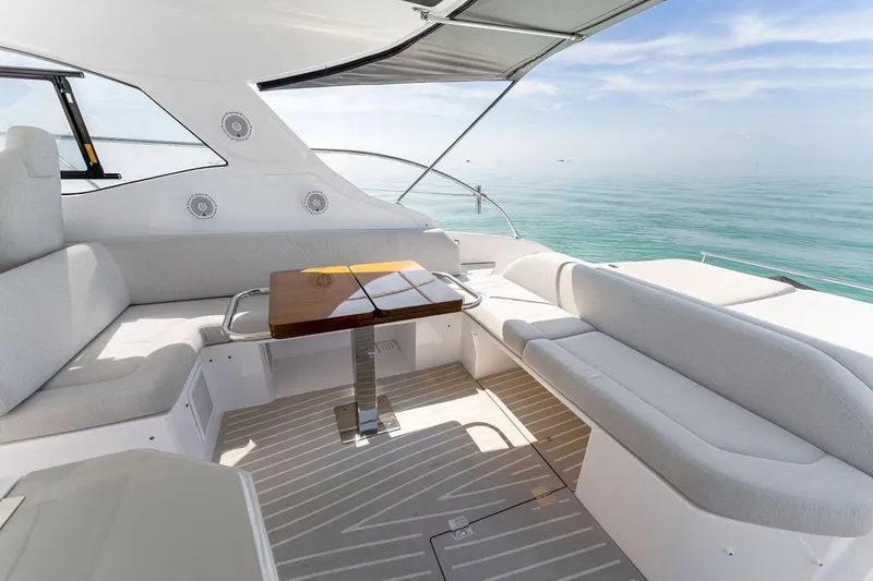 Slide: The Image of Luxurious Azimut Atlantis 45 yacht interior with elegant seating and ocean view, 2021 model. - 13