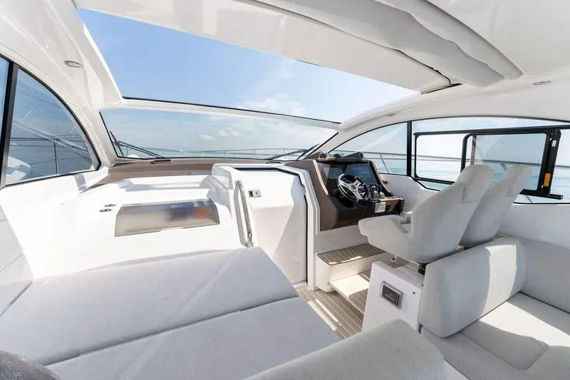 Slide: The Image of Interior view of 2021 Azimut Atlantis 45 yacht with modern helm and seating. - 17