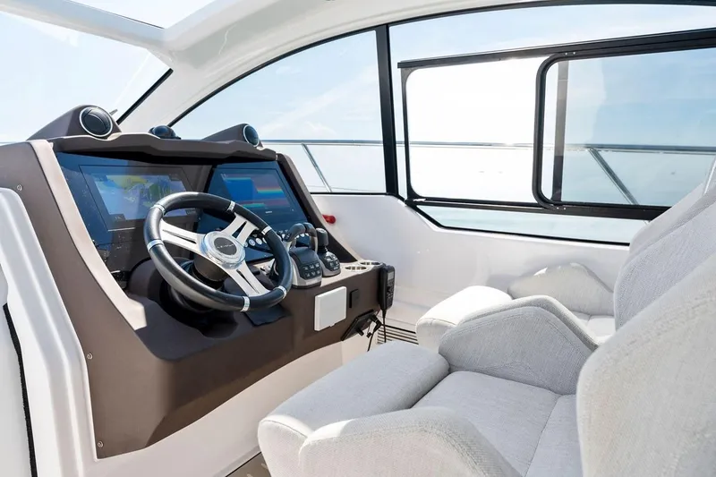 Slide: The Image of Interior cockpit of 2021 Azimut Atlantis 45 yacht with modern steering and navigation systems. - 21