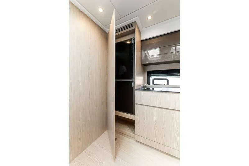 Slide: The Image of Modern interior of 2021 Azimut Atlantis 45 yacht with sleek cabinetry and lighting. - 26