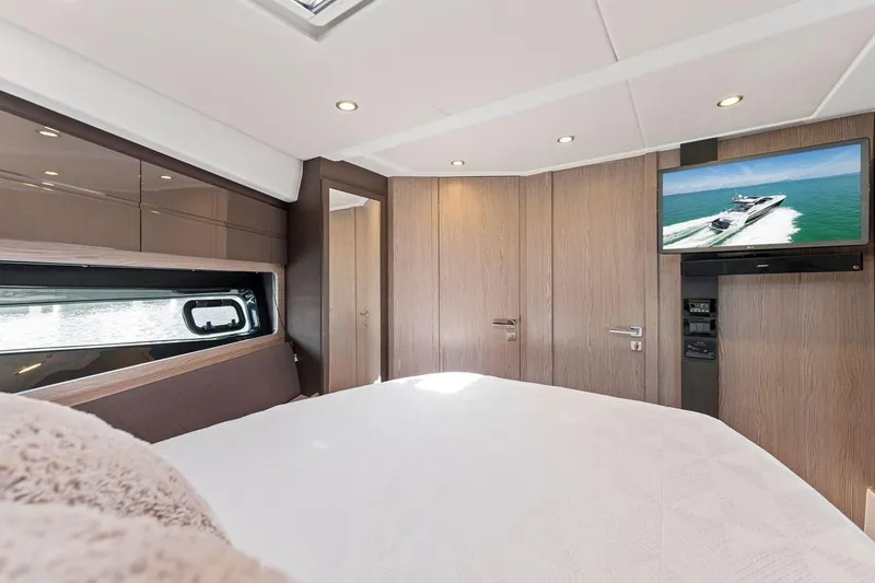 Slide: The Image of Luxurious bedroom interior of 2021 Azimut Atlantis 45 yacht with modern amenities. - 31