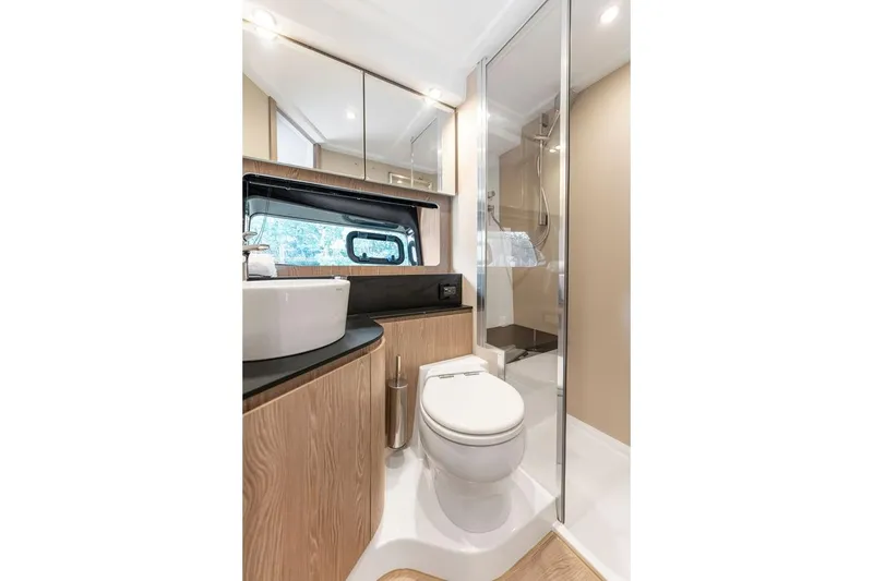 Slide: The Image of Luxurious bathroom in 2021 Azimut Atlantis 45 yacht with modern fixtures and elegant design. - 32