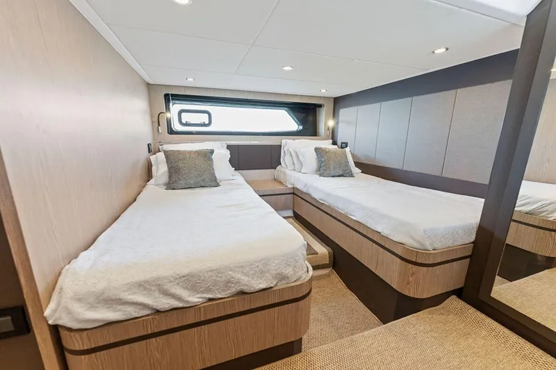Slide: The Image of Luxurious twin cabin interior of 2021 Azimut Atlantis 45 yacht, featuring modern design and comfort. - 35