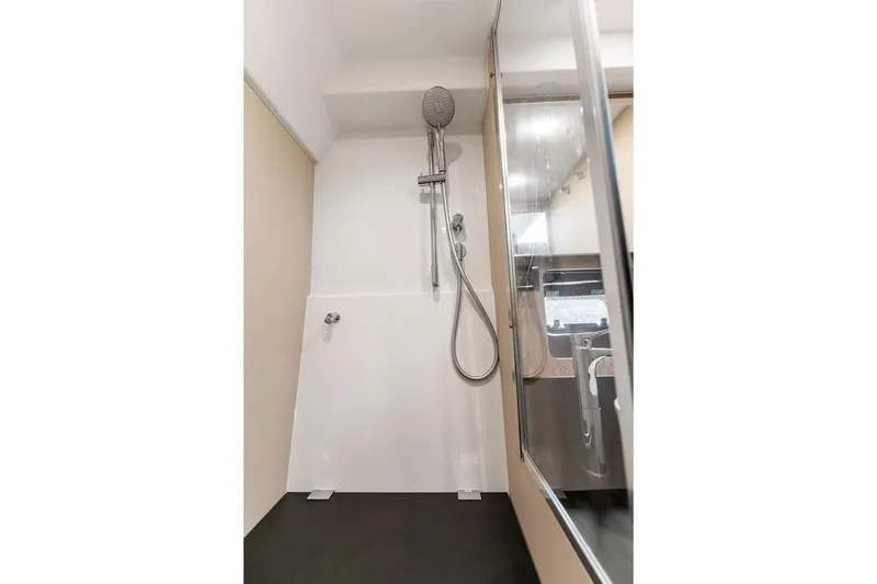 Slide: The Image of Shower area in 2021 Azimut Atlantis 45 yacht, featuring modern fixtures and glass enclosure. - 38