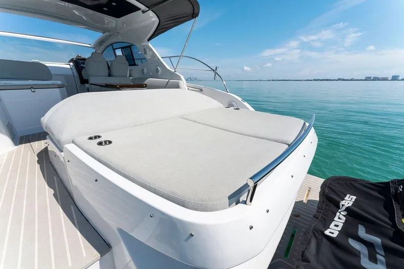 Slide: The Image of Luxurious 2021 Azimut Atlantis 45 yacht with spacious sunbed on calm waters. - 7